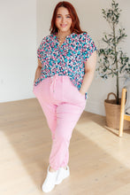 Load image into Gallery viewer, Lizzy Cap Sleeve Top in Navy and Hot Pink Floral

